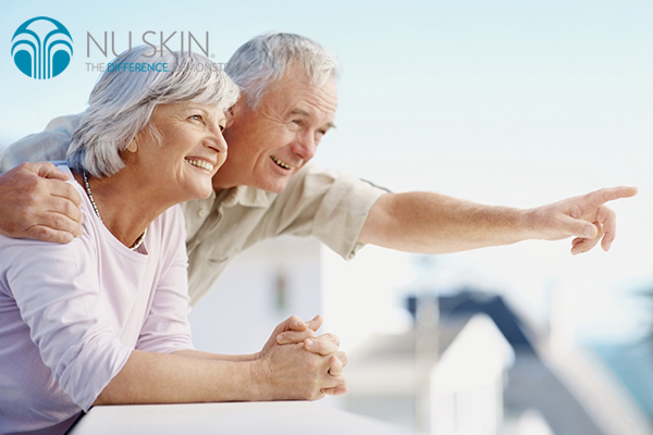 Senior man pointing out to something interesting to his wife